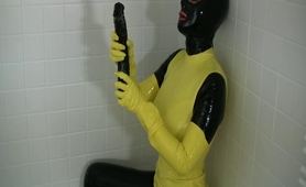 broad in yellow spandex uniform has cumming in bathroom
